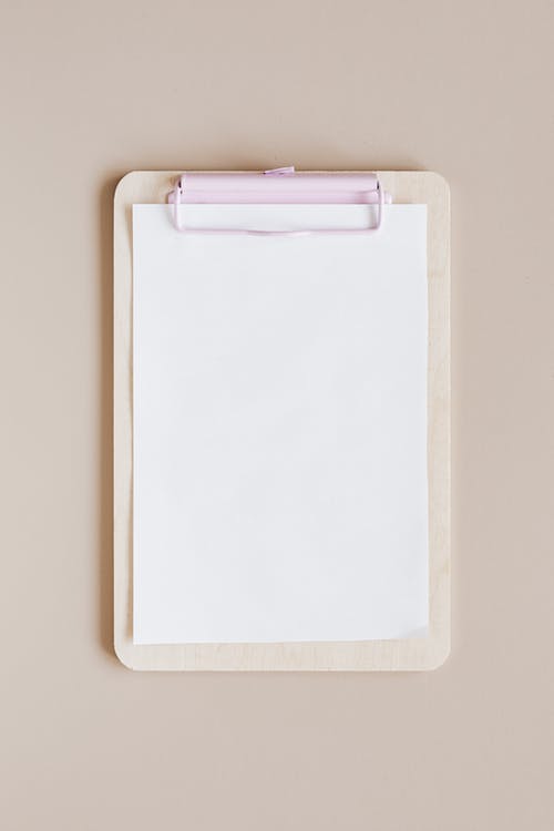 blank clipboard representing guest list creation