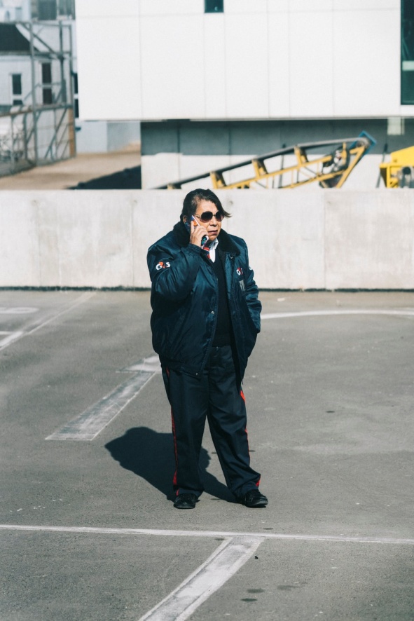 security guard using a walkie talkie